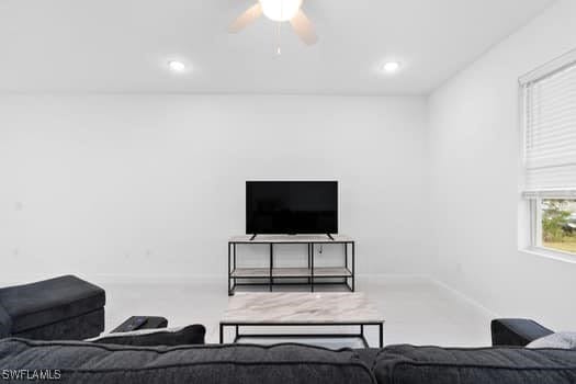 living room featuring ceiling fan