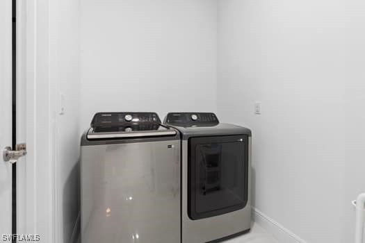 washroom featuring separate washer and dryer