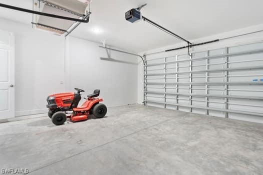 garage featuring a garage door opener