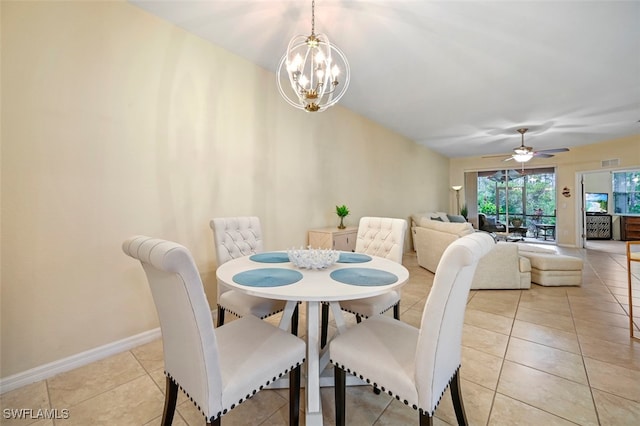 dining space featuring visible vents, baseboards, light tile patterned flooring, and ceiling fan with notable chandelier