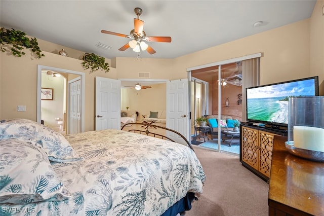 carpeted bedroom with visible vents, a closet, and ceiling fan