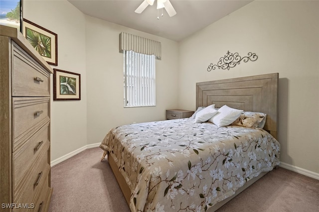 bedroom with baseboards, carpet, and a ceiling fan