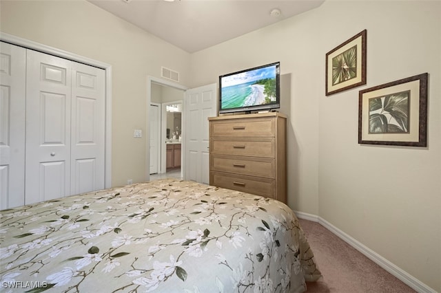 bedroom featuring baseboards, visible vents, a closet, and carpet floors