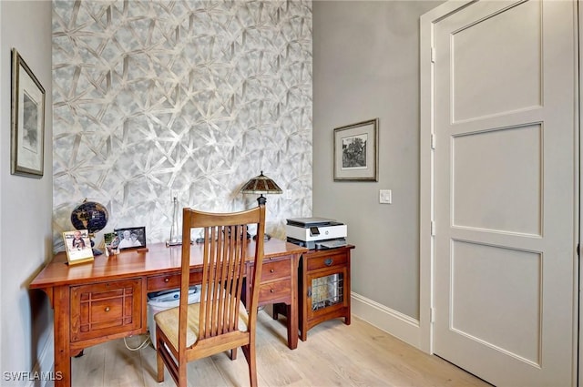 home office with light wood-type flooring