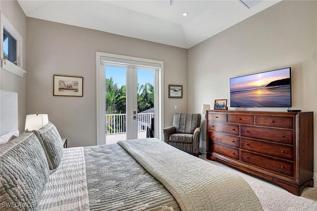 carpeted bedroom with french doors and access to outside