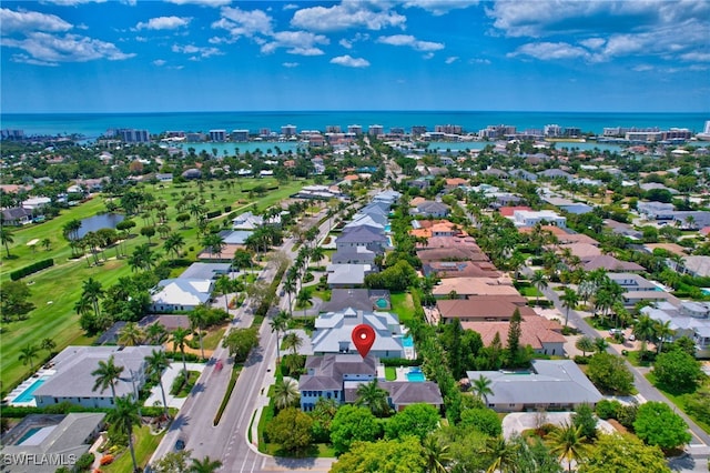 bird's eye view with a water view