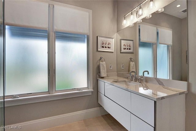 bathroom featuring vanity and tile patterned flooring