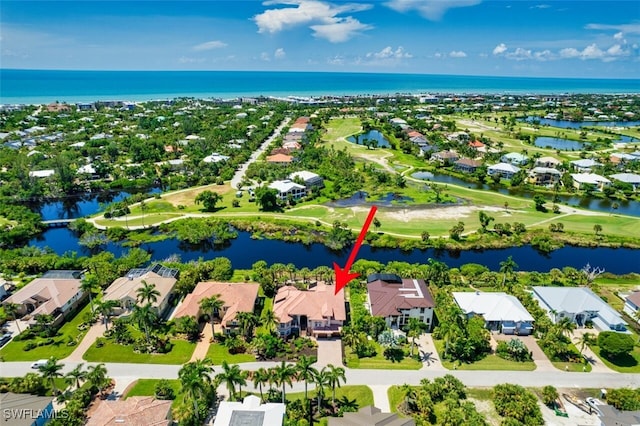 drone / aerial view with a water view