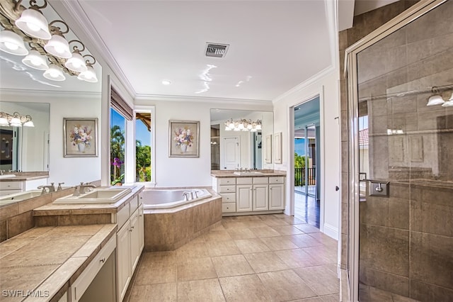 bathroom featuring ornamental molding, vanity, independent shower and bath, and tile patterned flooring