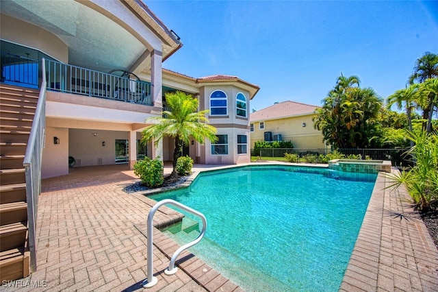 view of swimming pool featuring a patio