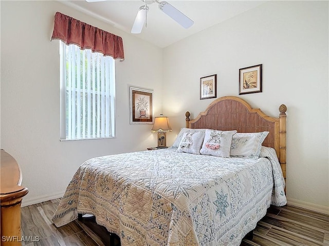 bedroom featuring hardwood / wood-style floors and ceiling fan