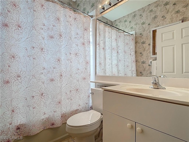 full bathroom featuring shower / tub combo with curtain, vanity, and toilet