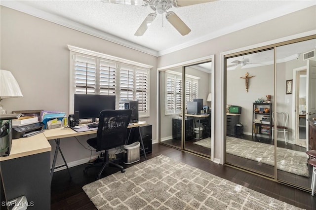 office space with dark hardwood / wood-style flooring, ceiling fan, and a textured ceiling