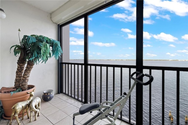 sunroom with a water view