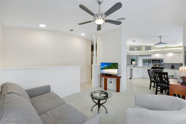 living area featuring ceiling fan, light tile patterned flooring, visible vents, and recessed lighting