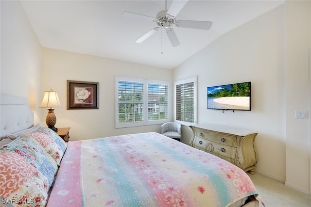 bedroom featuring lofted ceiling, ceiling fan, baseboards, and carpet flooring