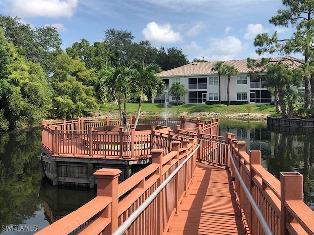 dock area with a water view