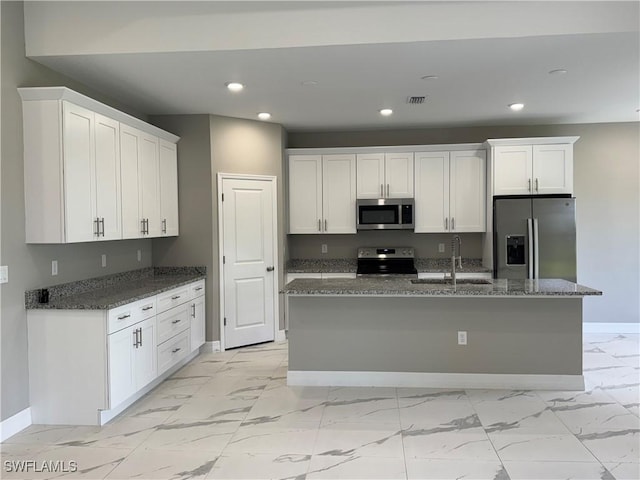 543 Mcarthur Blvd, Lehigh Acres, FL 33974 - kitchen featuring appliances with stainless steel finishes, a sink, baseboards, light marble finish flooring, and recessed lighting