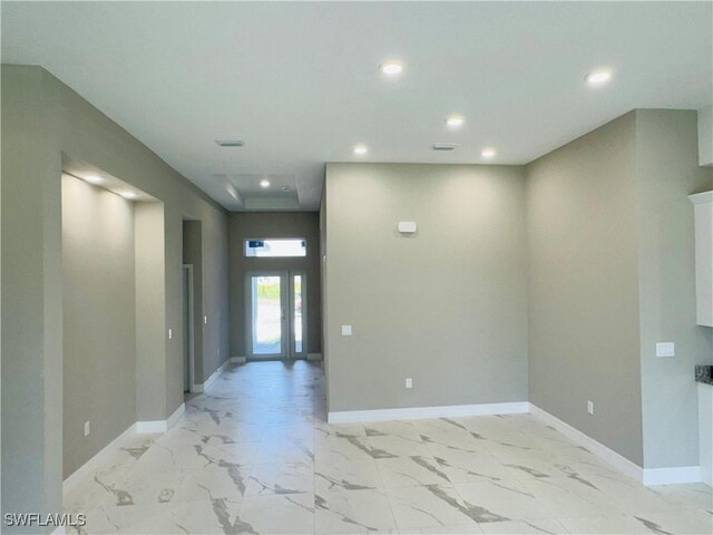 543 Mcarthur Blvd, Lehigh Acres, FL 33974 - spare room with recessed lighting, light marble finish flooring, and baseboards