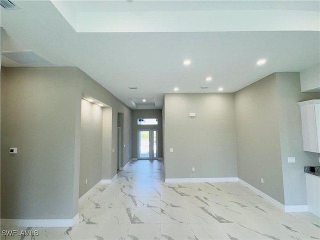 543 Mcarthur Blvd, Lehigh Acres, FL 33974 - hall with baseboards, light marble finish floors, and recessed lighting