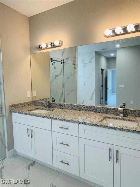 543 Mcarthur Blvd, Lehigh Acres, FL 33974 - full bathroom featuring marble look tiles, a marble finish shower, and double vanity