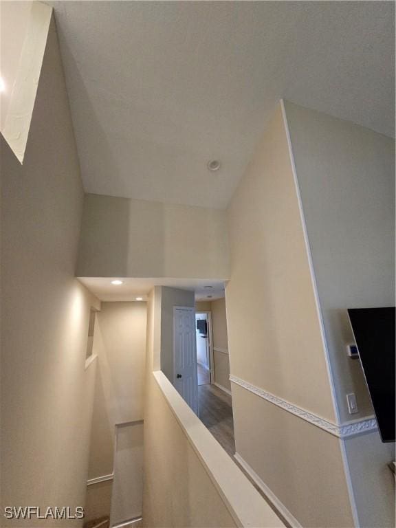 hallway with recessed lighting