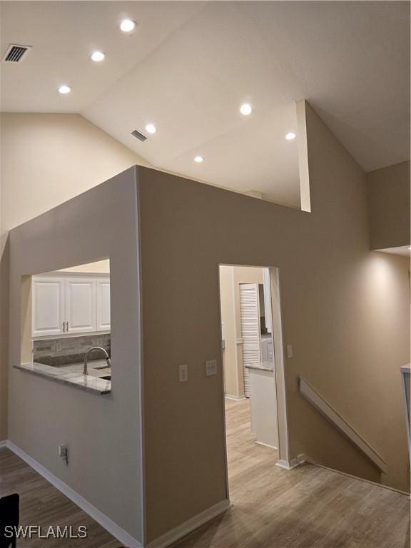 12051 Champions Green Way Unit 322, Fort Myers, FL 33913 - bonus room featuring light wood-style flooring, high vaulted ceiling, recessed lighting, and baseboards