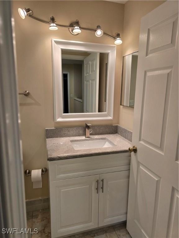 12051 Champions Green Way Unit 322, Fort Myers, FL 33913 - bathroom with vanity and tile patterned flooring