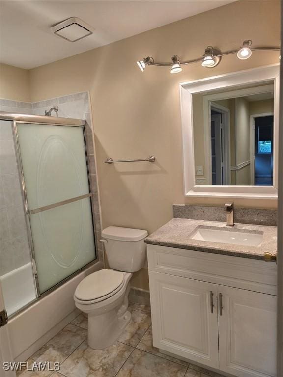 12051 Champions Green Way Unit 322, Fort Myers, FL 33913 - full bath with vanity, toilet, and bath / shower combo with glass door