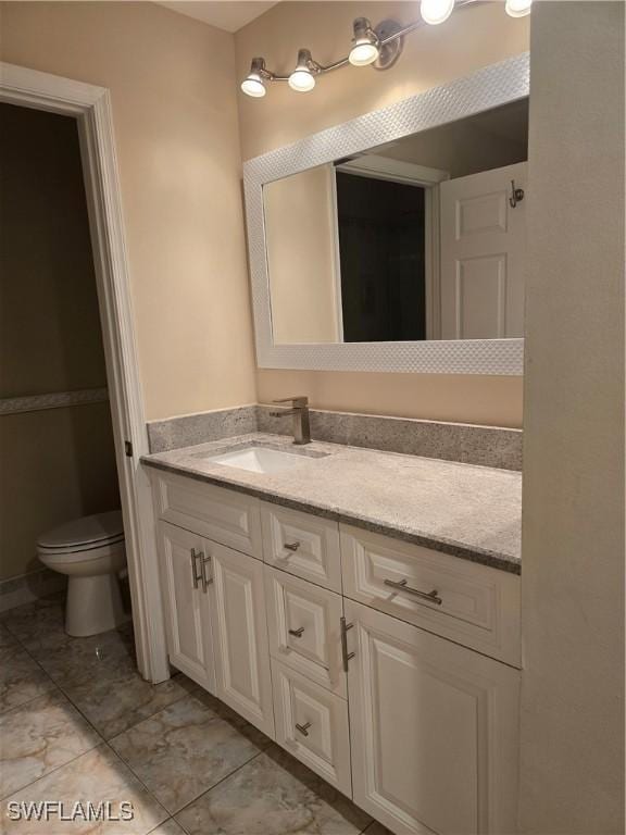 12051 Champions Green Way Unit 322, Fort Myers, FL 33913 - bathroom featuring vanity and toilet