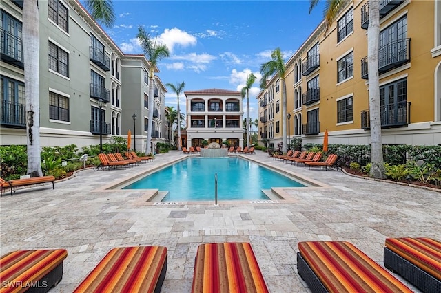 view of pool featuring a patio