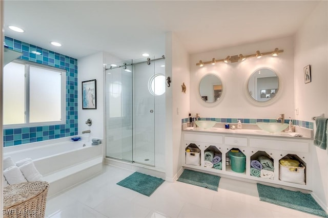 3025 Turtle Gait Ln, Sanibel, FL 33957 - full bathroom featuring tile patterned flooring, a bath, a sink, and a stall shower