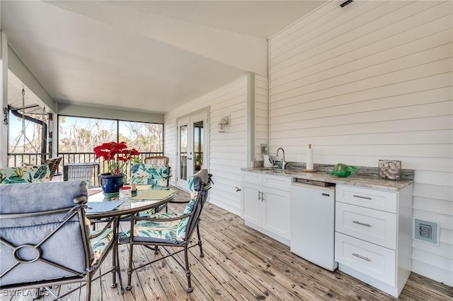 3025 Turtle Gait Ln, Sanibel, FL 33957 - sunroom / solarium featuring french doors, a sink, and visible vents