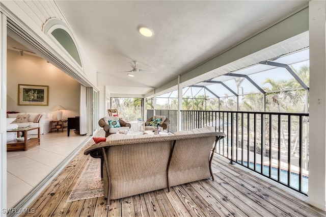 3025 Turtle Gait Ln, Sanibel, FL 33957 - sunroom / solarium featuring a ceiling fan and an outdoor hangout area