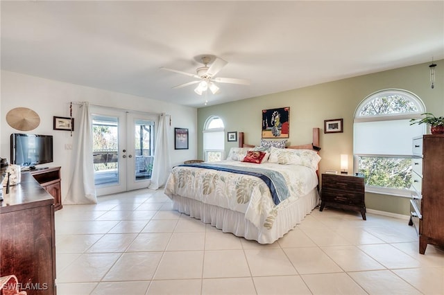 3025 Turtle Gait Ln, Sanibel, FL 33957 - bedroom featuring access to outside, french doors, light tile patterned floors, and multiple windows
