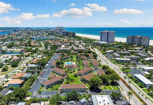 aerial view with a beach view and a water view