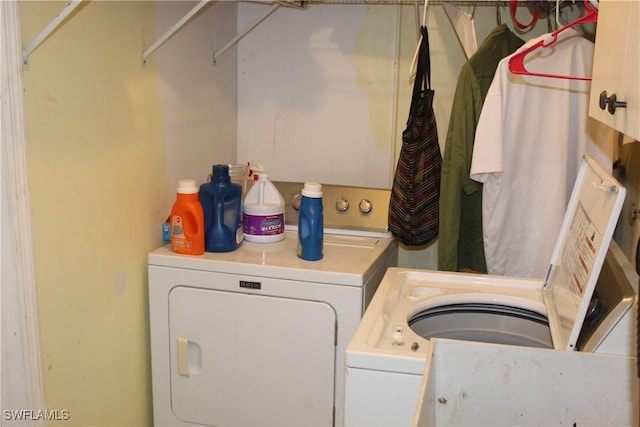 washroom with washer and clothes dryer