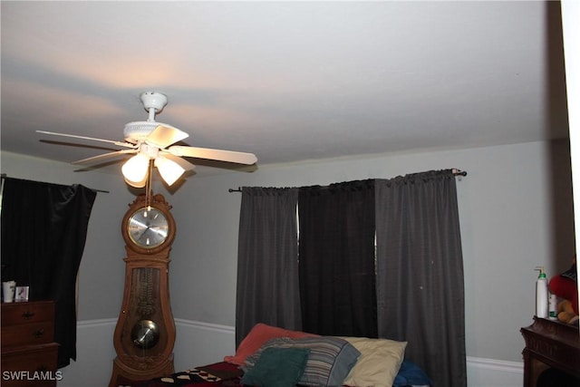 bedroom featuring ceiling fan