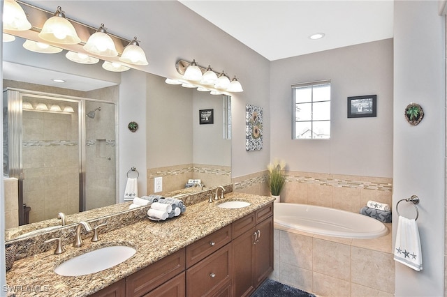 bathroom with vanity and plus walk in shower