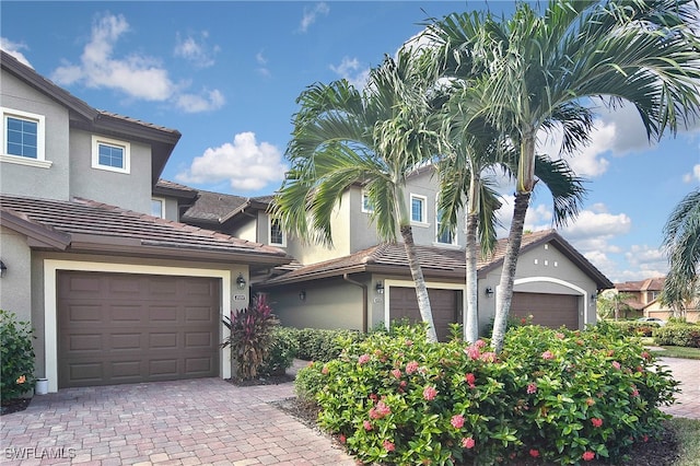 view of front of property with a garage