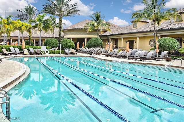 view of swimming pool with a patio area