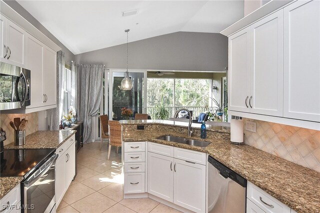 kitchen with white cabinetry, stainless steel appliances, and sink