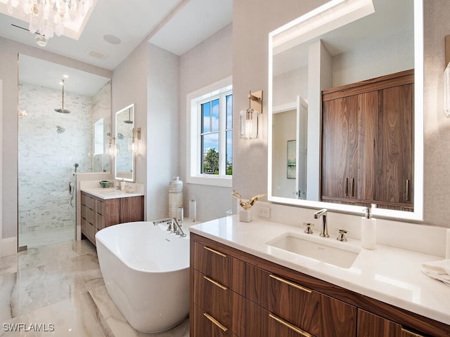 bathroom featuring vanity and plus walk in shower