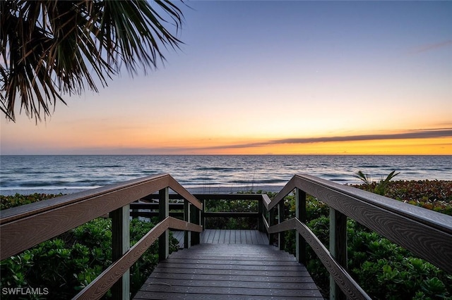 exterior space with a water view