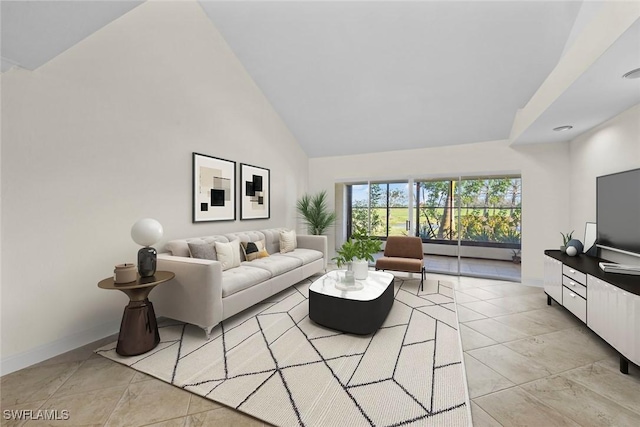 living room with high vaulted ceiling