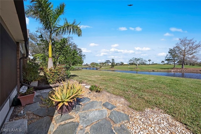 view of yard with a water view