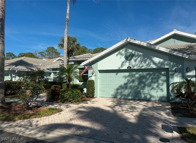 view of property exterior with a garage