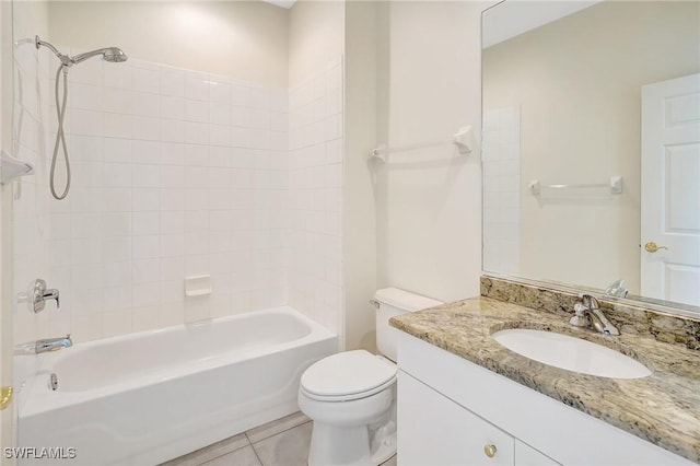 bathroom featuring toilet, tile patterned flooring, shower / bathtub combination, and vanity