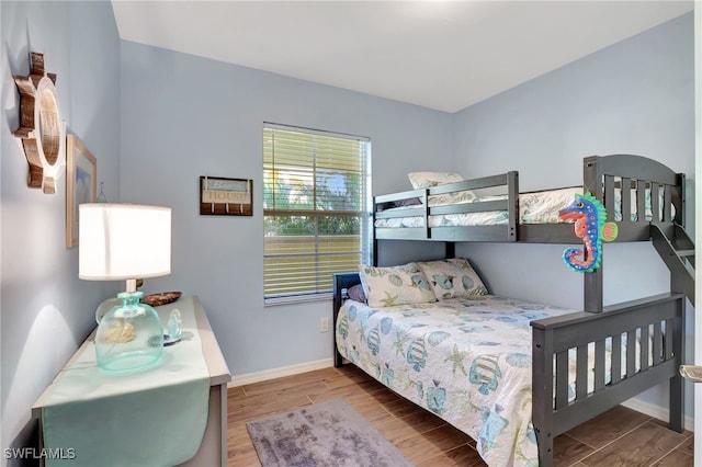 bedroom with light hardwood / wood-style floors