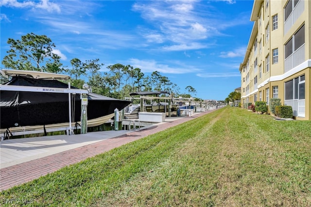 dock area with a yard